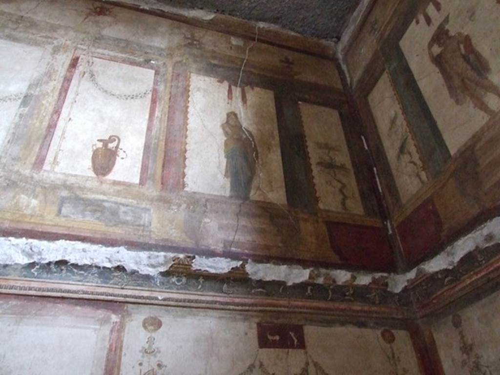 VI.15.1 Pompeii. December 2006. Detail of painting from upper north wall in north-east corner of oecus on south side of atrium.