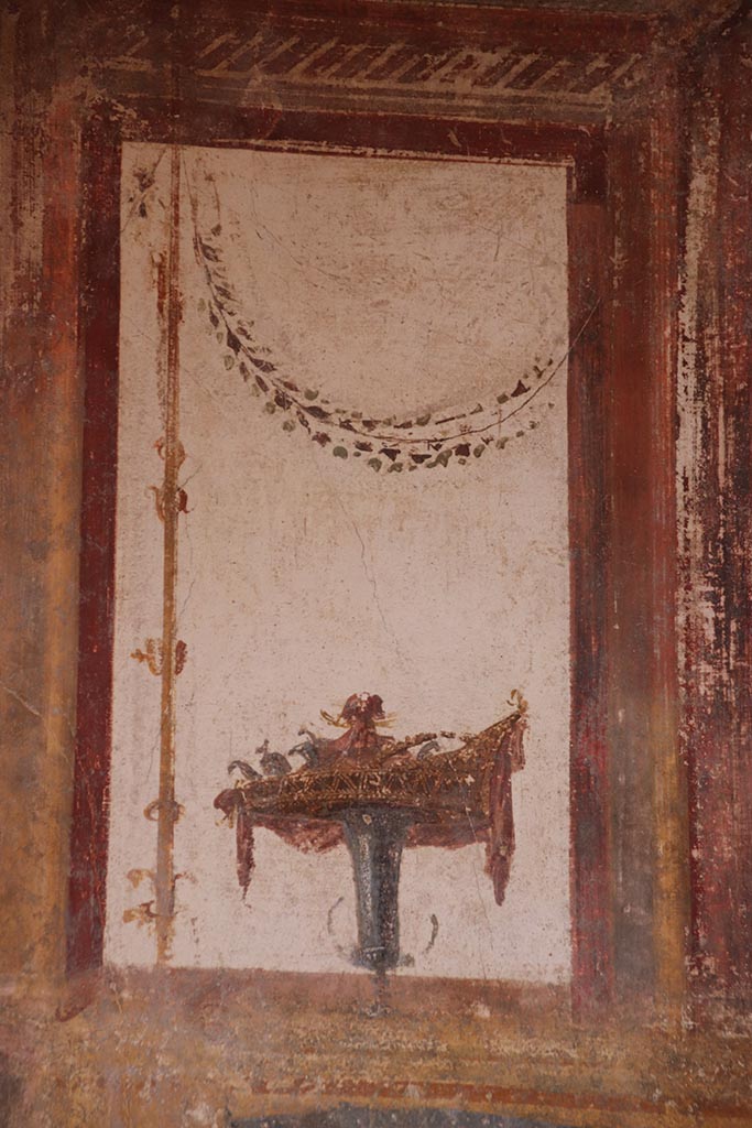 VI.15.1 Pompeii. October 2024.
Detail from upper west wall at north end. Photo courtesy of Klaus Heese.