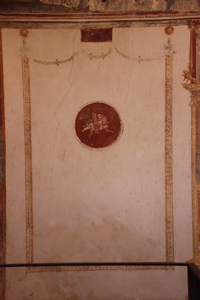 VI.15.1 Pompeii. October 2024.
Detail of panel at south end of west wall. Photo courtesy of Klaus Heese.