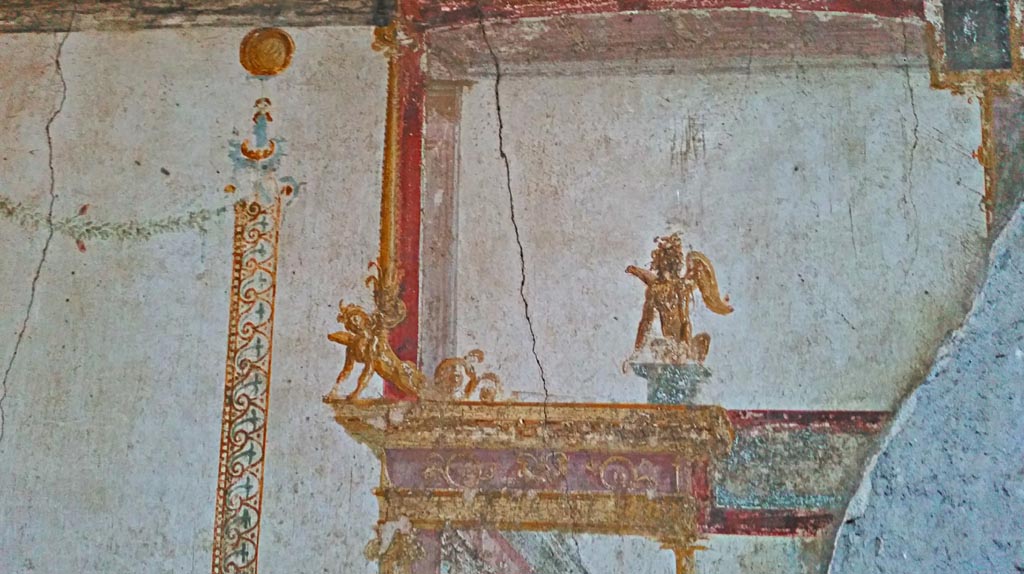 VI.15.1 Pompeii. December 2019. Detail of painted decoration from panel on west wall of oecus. Photo courtesy of Giuseppe Ciaramella.