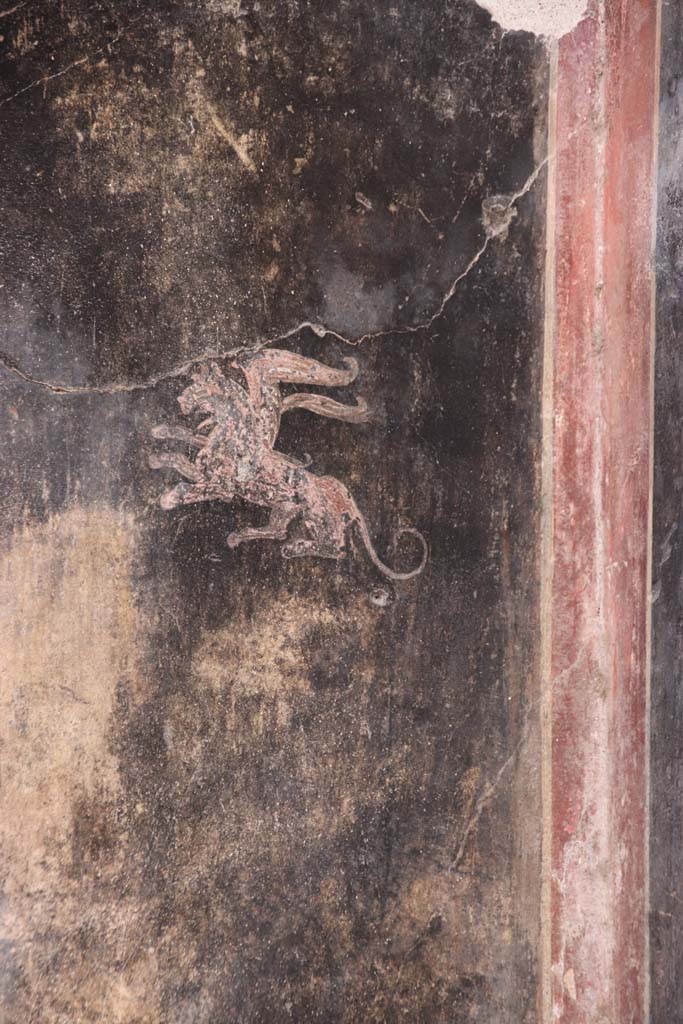 VI.15.1 Pompeii. October 2020.
Painting of griffin on west wall of vestibule. Photo courtesy of Klaus Heese.