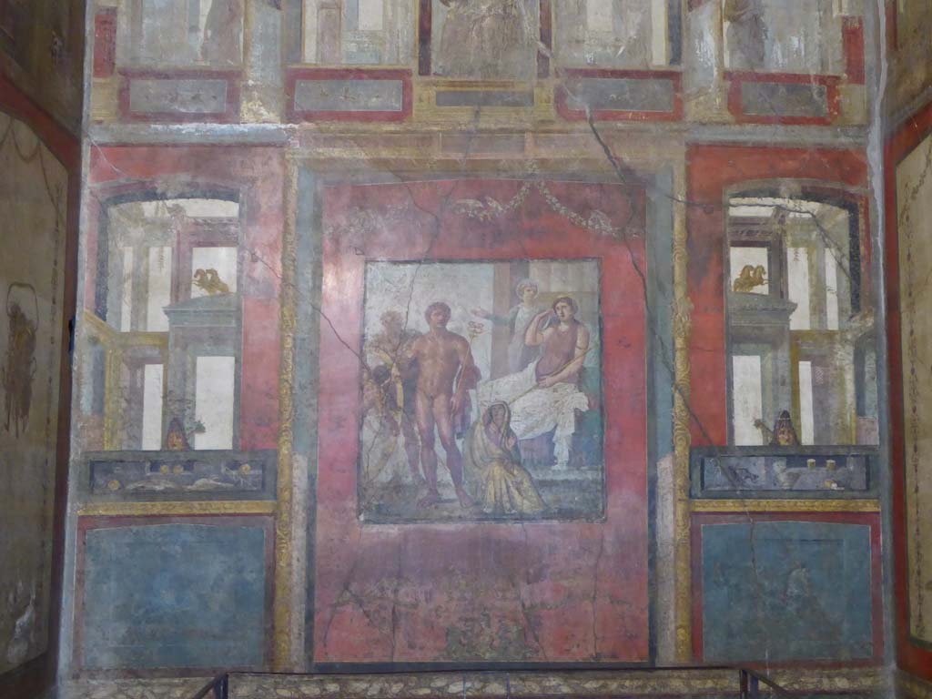 VI.15.1 Pompeii. January 2017. Looking towards the east wall, on either side of the central panel were painted panels.
On the left (north side) painted food was shown, with mask above.
On the right (south side) painted drinks were shown, with mask above.
Foto Annette Haug, ERC Grant 681269 DÉCOR.