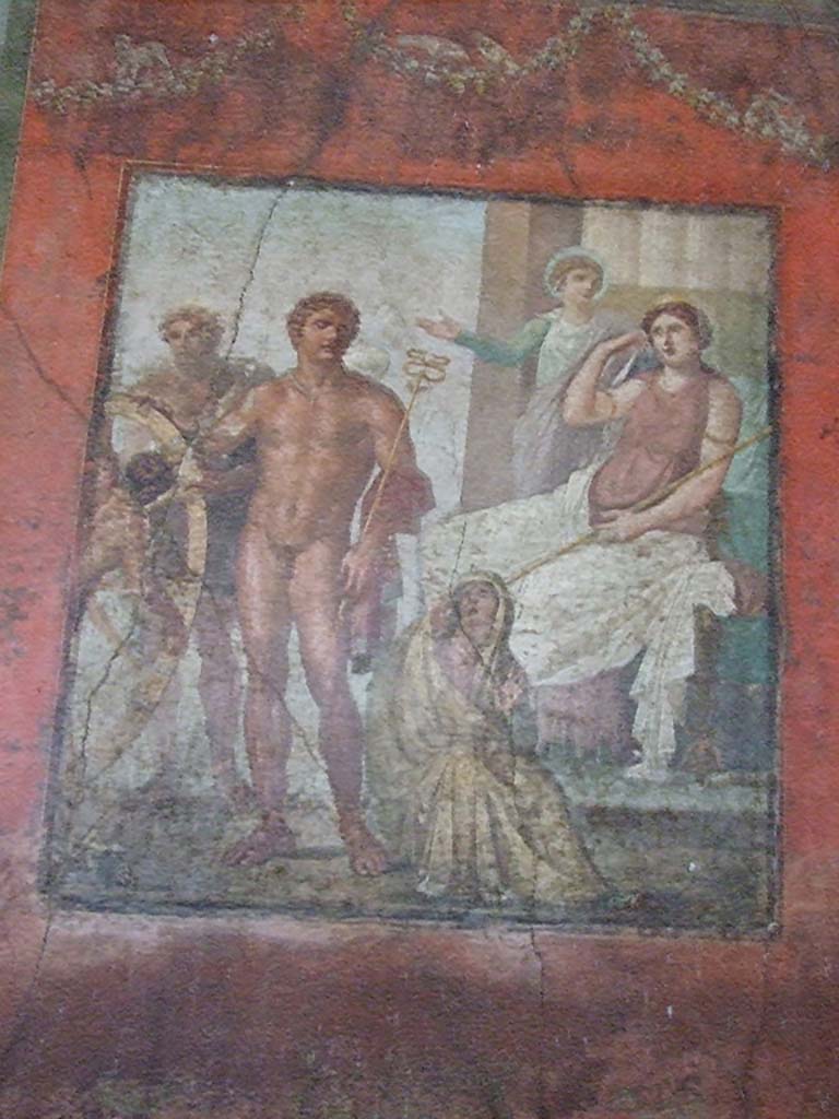 VI.15.1 Pompeii. December 2006.
East wall of exedra with wall painting of the torture of Ixion on the wheel.