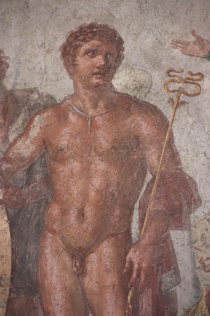VI.15.1 Pompeii. October 2024.
Detail of Mercury with his caduceus from central panel on north wall. Photo courtesy of Klaus Heese.