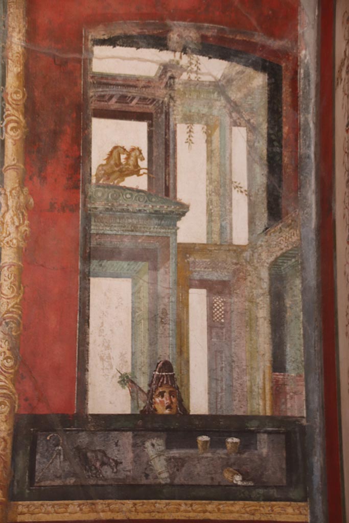 VI.15.1 Pompeii. October 2024.
East wall at south end in exedra, painted panel with drink. Photo courtesy of Klaus Heese.