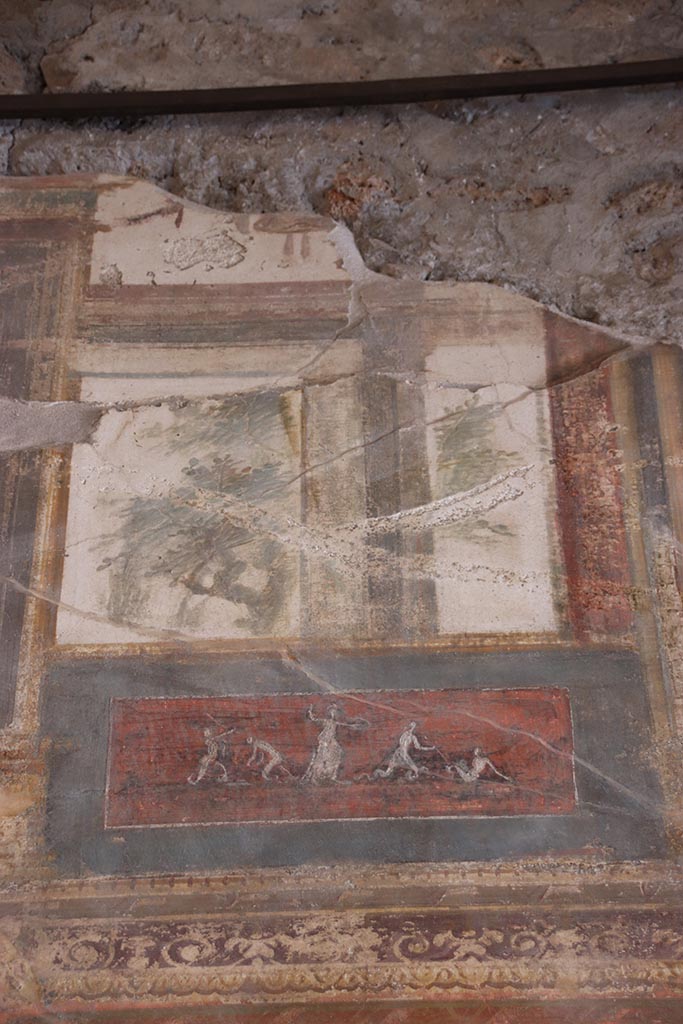 VI.15.1 Pompeii. October 2024.
Upper south wall towards west end, painted panels. Photo courtesy of Klaus Heese.