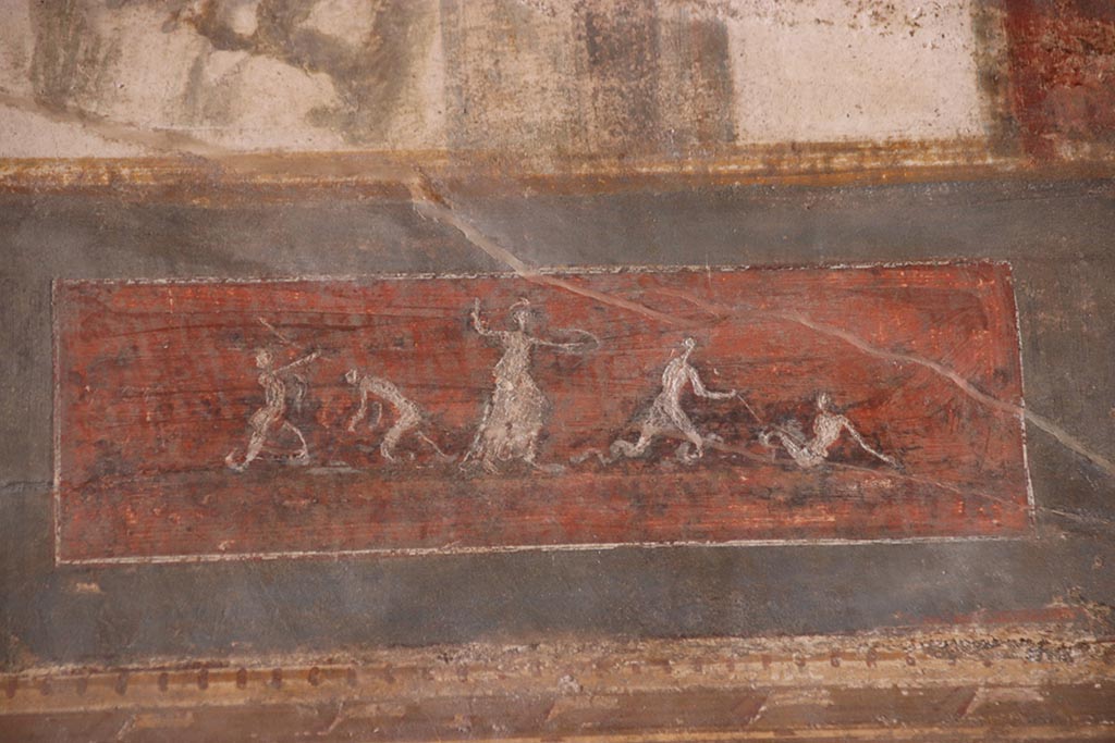 VI.15.1 Pompeii. October 2024. Upper south wall, detail of painted panel towards west end. Photo courtesy of Klaus Heese.