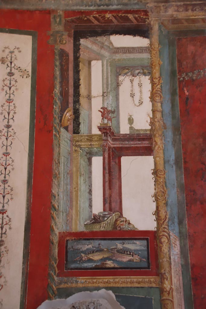 VI.15.1 Pompeii. October 2023.
South wall of exedra, panel east side of central painting. Photo courtesy of Klaus Heese.