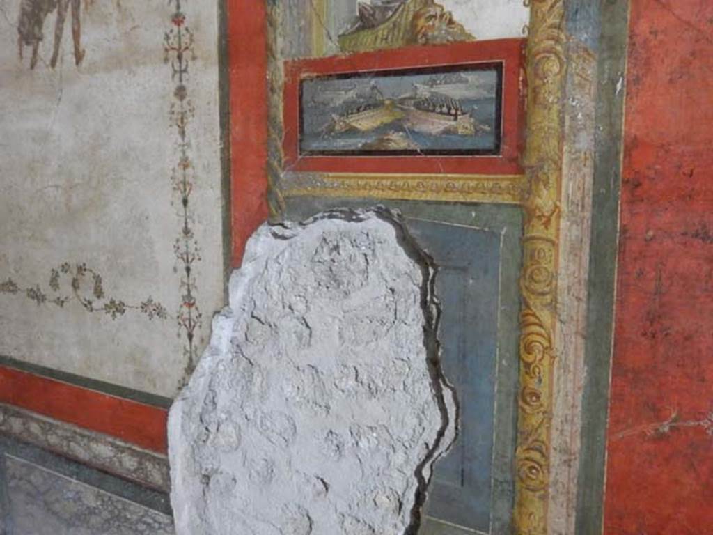 VI.15.1 Pompeii. May 2017. Panel with naval scene on east side of central painting on south wall of exedra. Photo courtesy of Buzz Ferebee.