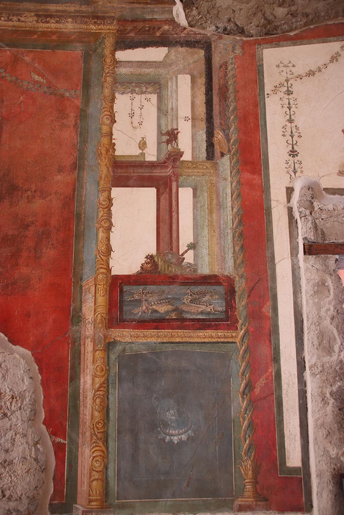 VI.15.1 Pompeii. October 2024.
Painted panel on west side of central painting on south wall. Photo courtesy of Klaus Heese.