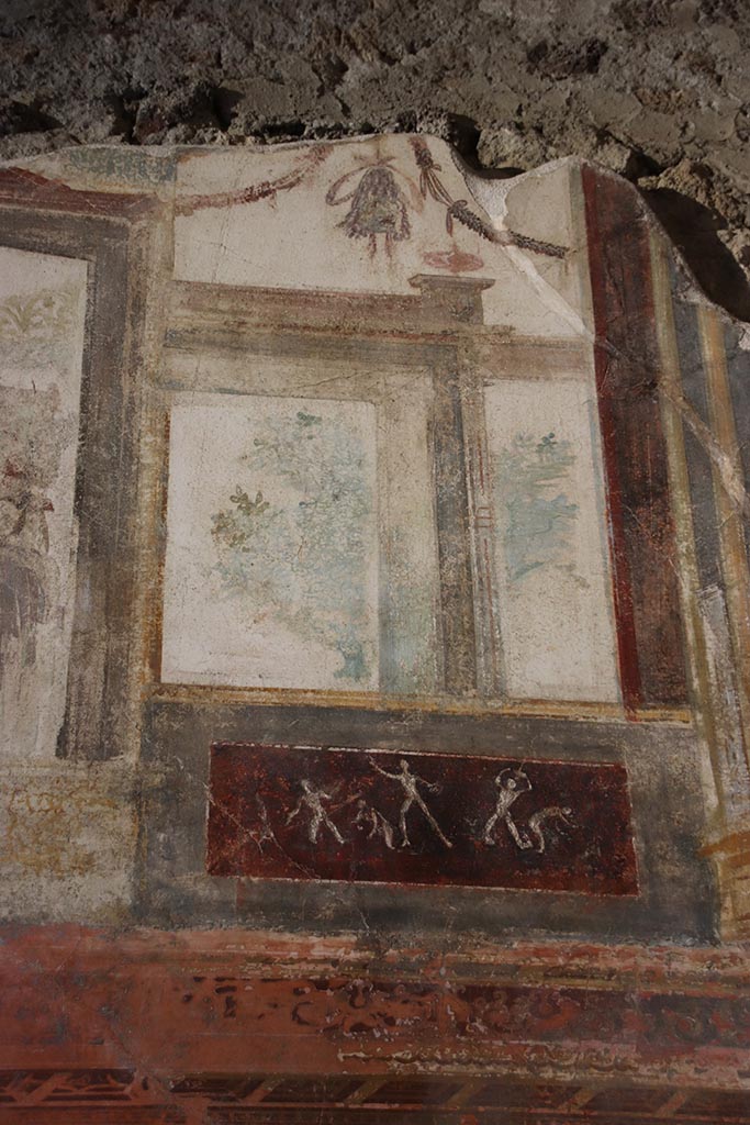 VI.15.1 Pompeii. October 2024.
Upper north wall of exedra, detail from above middle panel. Photo courtesy of Klaus Heese.