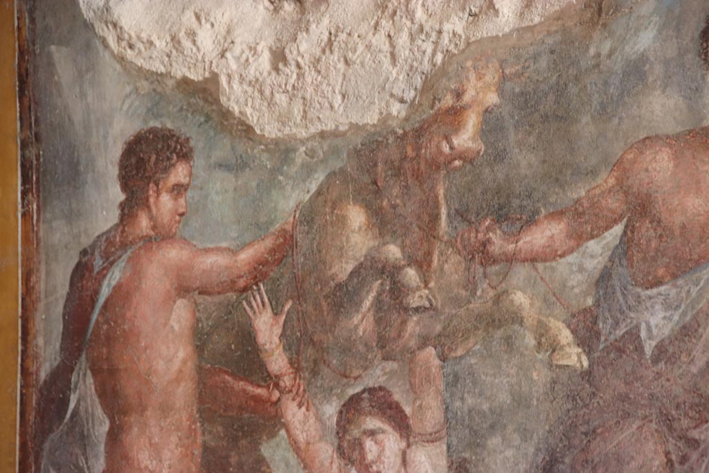 VI.15.1 Pompeii. October 2023.
Detail from left side of painting of the Punishment of Dirce from centre of south wall of exedra. Photo courtesy of Klaus Heese.