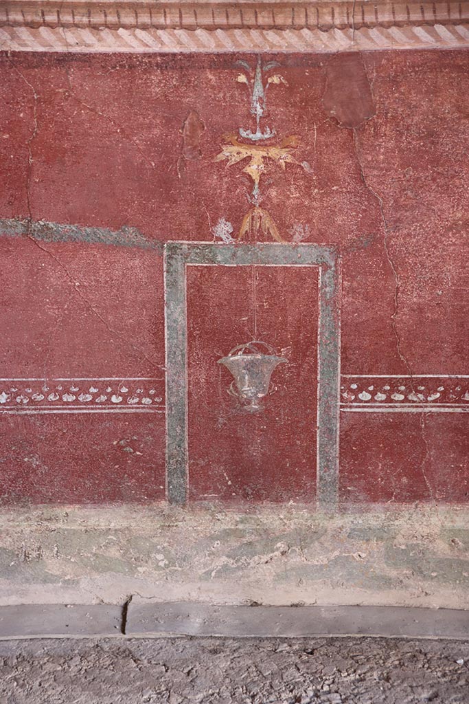 VI.15.1 Pompeii. October 2024.
Detail of zoccolo from west end of lower south wall in exedra. Photo courtesy of Klaus Heese.