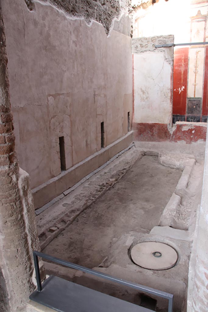 VI.15.1 Pompeii. October 2023.
Looking towards small garden area, west wall and cistern mouth in south-east corner.
Photo courtesy of Klaus Heese.