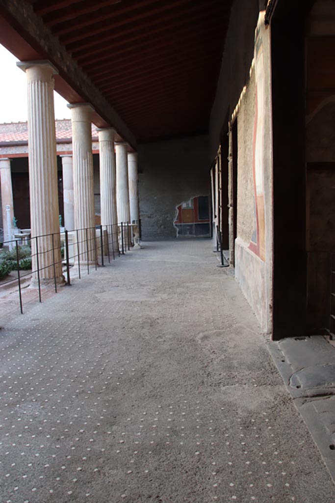 VI.15.1 Pompeii. October 2023.
Looking north along east portico from outside south-east exedra. Photo courtesy of Klaus Heese.