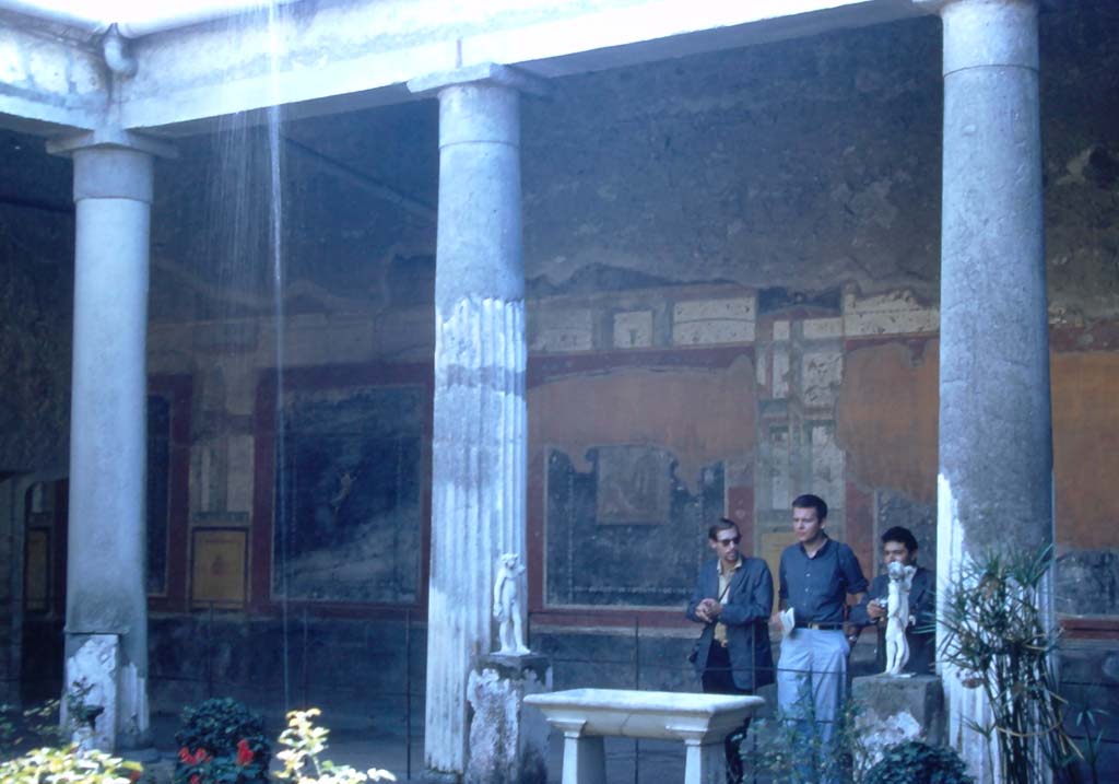 VI.15.1 Pompeii. 1960’s. Looking towards the south wall at the east end of the south portico of the peristyle.
Photo courtesy of Rick Bauer.