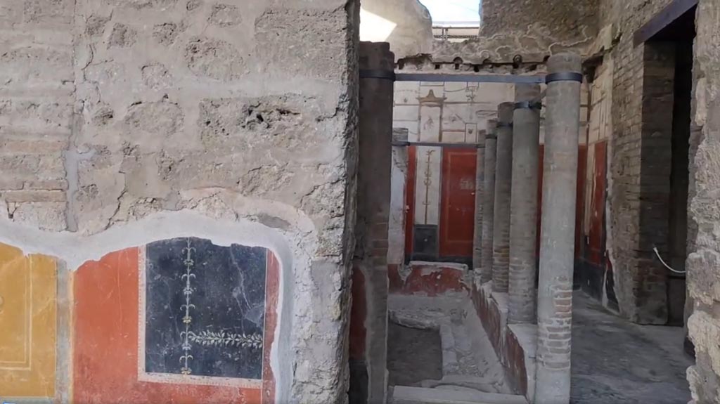 VI.15.1 Pompeii. April 2023. 
Looking north through doorway into small courtyard, from north portico. Photo courtesy of Giuseppe Ciaramella.
