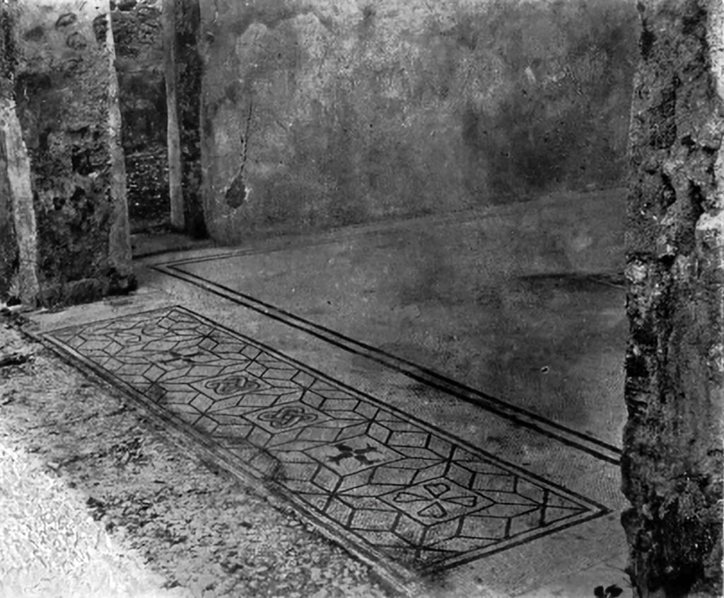 VI.15.5 Pompeii. c.1930. Room 7, looking north along coloured mosaic floor on west side of tablinum, linking with peristyle.
See Blake, M., (1930). The pavements of the Roman Buildings of the Republic and Early Empire. Rome, MAAR, 8, (p.119f, & Pl.32, tav.2).