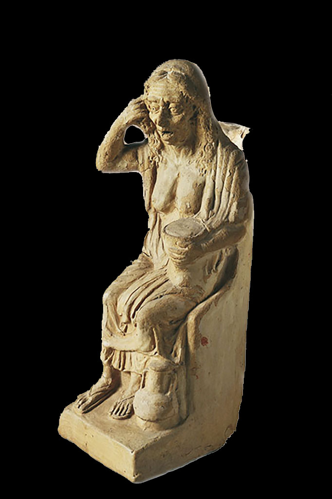 VI.15.5 Pompeii. Clay figurine of an old drunken woman, 0.41m high incl. base.
The statuette served as a jug for liquid, as could be seen by the ribbon handle, now broken, that was attached at the shoulders.
The hole for the liquid was seen between the neck and the top of the handle.
See Notizie degli Scavi di Antichità, 1897, p.24, fig. 2.
It was found in October 1895 in or near the garden niche, together with a group of other objects.
See Notizie degli Scavi di Antichità, 1895, p.438.
Now in Naples Archaeological Museum, inventory number 124844.