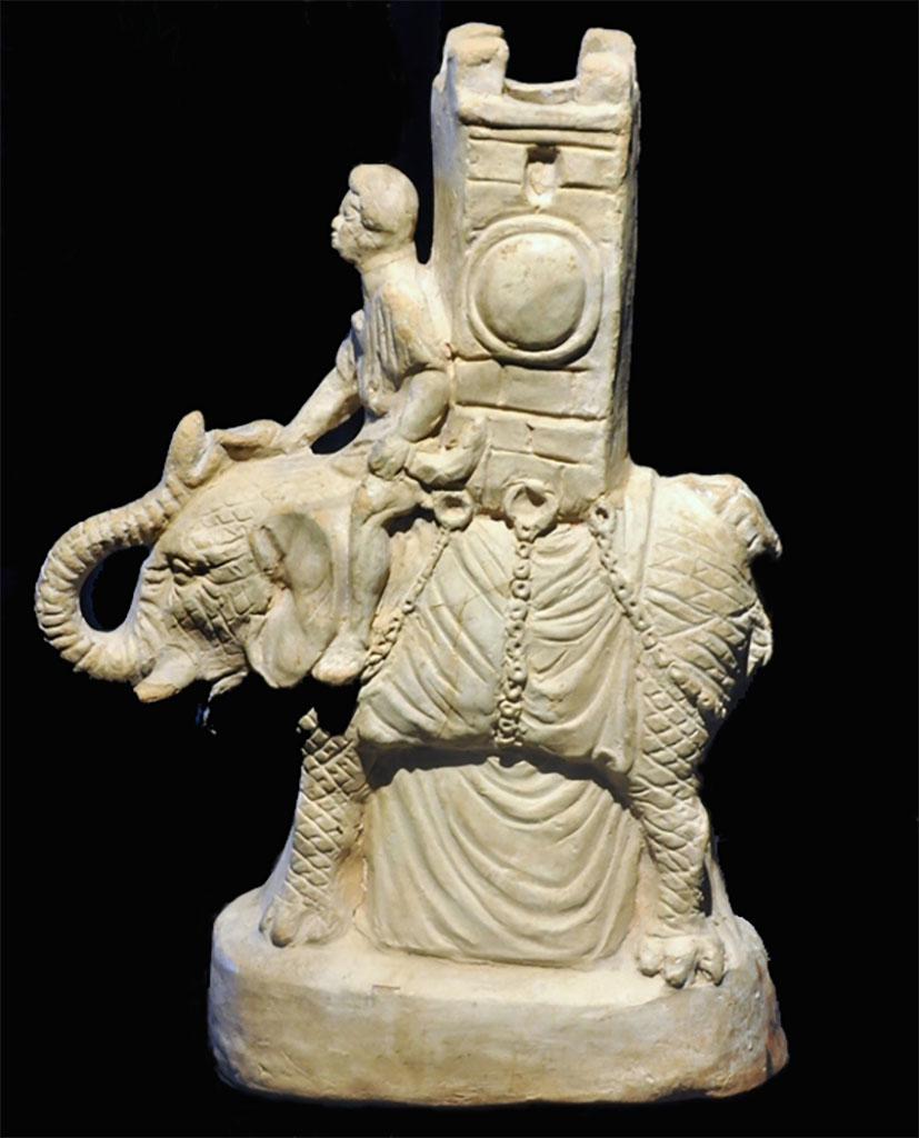VI.15.5 Pompeii. Clay figurine of an elephant carrying a tower on its back.
Now in Naples Archaeological Museum. Inventory number 124845.