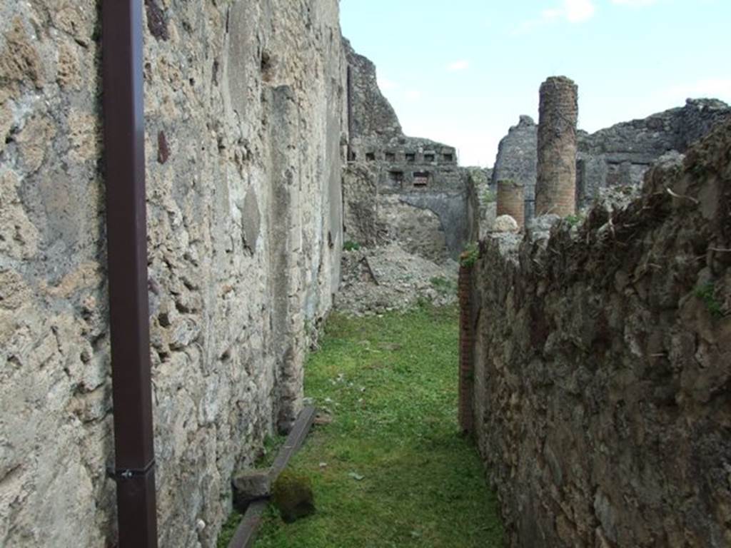 VI.15.6 Pompeii. March 2009. Room 6.  Corridor looking east to atrium.