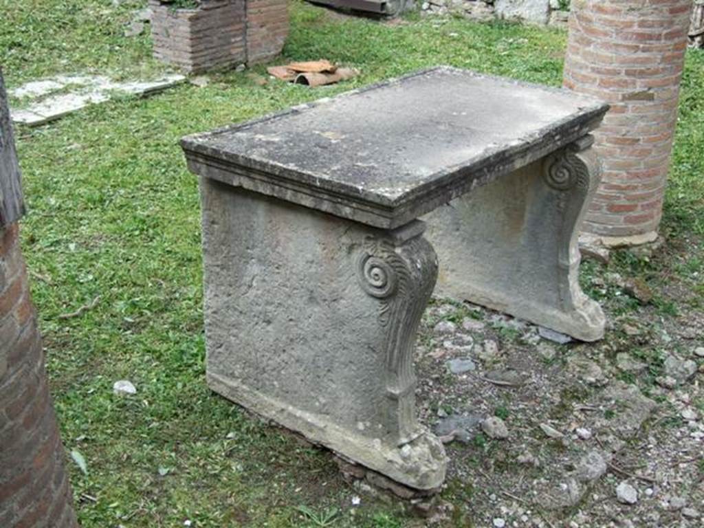 VI.15.6 Pompeii. March 2009. Room 1, south side of table near impluvium.