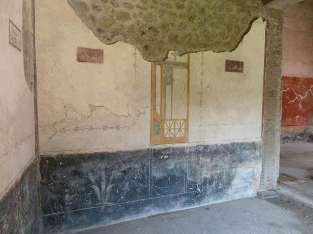 VI.15.8 Pompeii. May 2010. North wall of tablinum. According to NdS, the two painted panels on the north wall had purple backgrounds. One showed a deer fleeing to the left followed by a dog, on the left was an idol of Priapus. The other showed a deer being attacked by a dog, also on the left perhaps was an idol of Priapus.  See Notizie degli Scavi, 1897, January, p. 34.