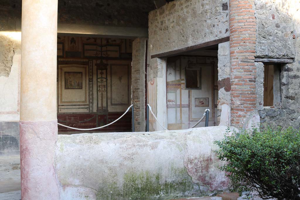VI.15.8 Pompeii. December 2018. 
Looking east from garden to portico with doorways to oecus and doorway and window of summer triclinium.
Photo courtesy of Aude Durand.
