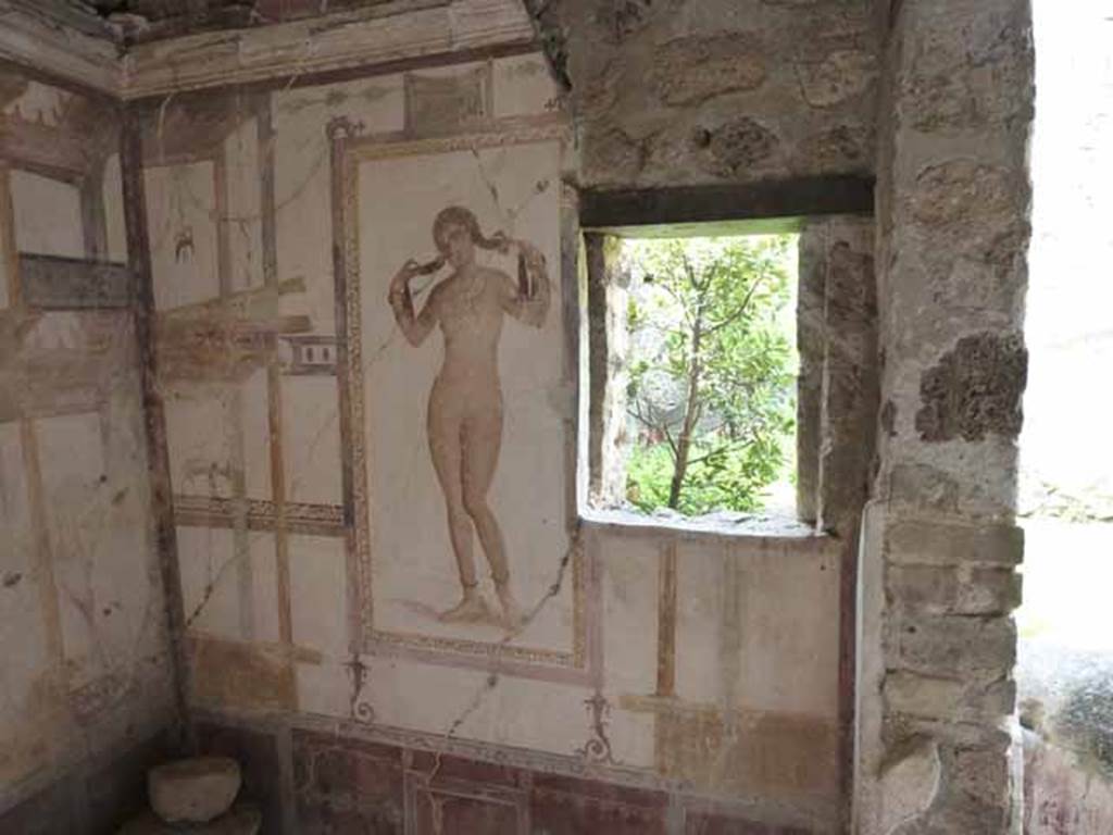 VI.15.8 Pompeii. May 2010. West wall and south-west corner of summer triclinium.  
According to NdS, this small room covered by a vault, also received light from two small windows which opened in the side walls.