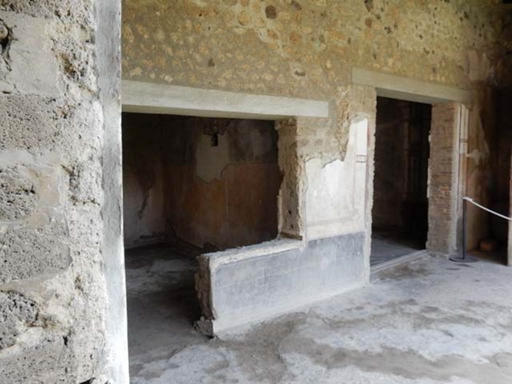 VI.15.8 Pompeii. May 2015. Doorways to rooms on east side of portico.  Photo courtesy of Buzz Ferebee.
