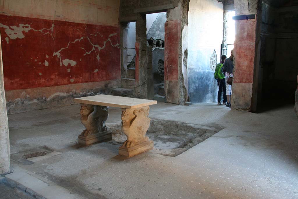 VI.15.8 Pompeii. April 2013. Looking north-east across atrium, with entrance corridor, centre right.
Photo courtesy of Klaus Heese.