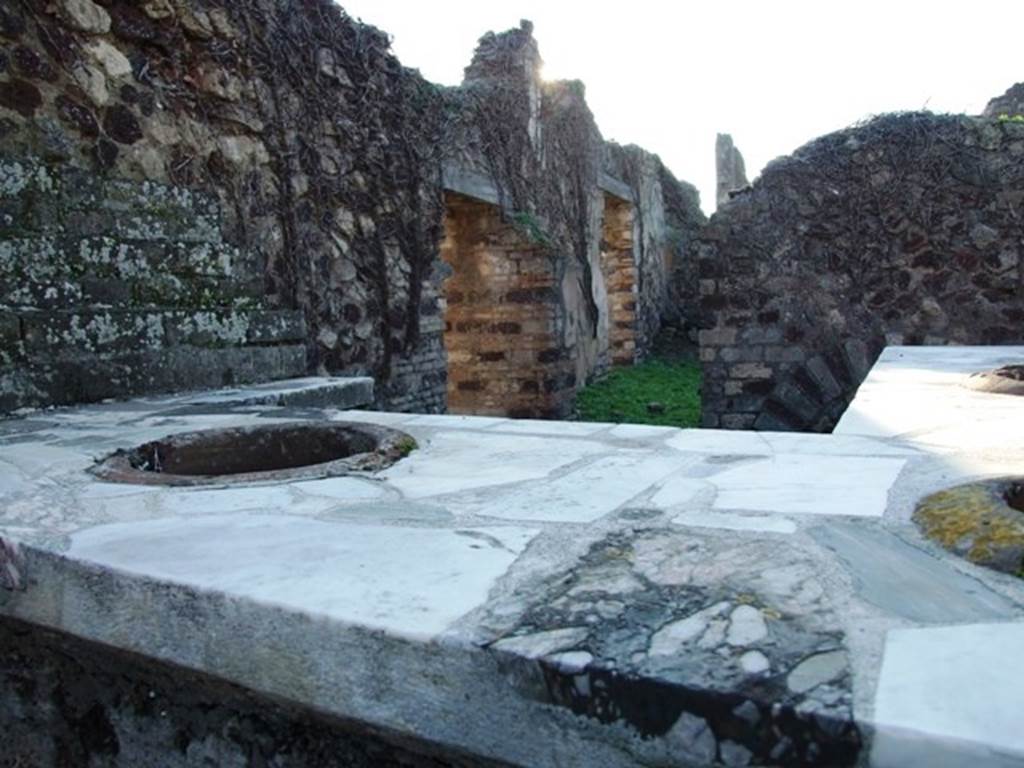 VI.15.15 Pompeii. December 2007. Looking towards two doorways in south wall, of the long corridor of VI.15.14.