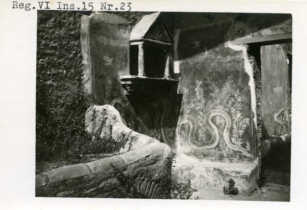 VI.15.23 Pompeii. Pre-1937-39. 
Lararium in north-west corner of kitchen, near doorway to south portico, with serpents extending over both the west and north walls.
Photo courtesy of American Academy in Rome, Photographic Archive. Warsher collection no. 553.
