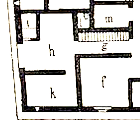 VI.15.1 Pompeii. South-east corner with entrance at VI.15.27 on left. 
Corridor g – from south side of atrium.
Room (shop) h – which acted as posticum to the house, with entrance at VI.15.27.
Latrine - i.
Stable – k.
Well - l (L).
See Sogliano, A. La Casa dei Vettii in Mon. Ant. 1898, (p.233-4, part of Fig.1)