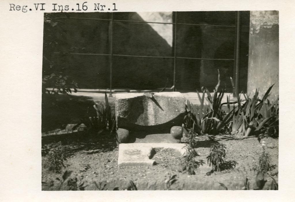 VI.16.7 Pompeii, but shown as VI.16.1 on photo. Pre-1937-39. 
Looking towards sundial in peristyle garden near north portico.
Photo courtesy of American Academy in Rome, Photographic Archive. Warsher collection no. 498.
According to Powers (ed) –
“This sundial was found in 1904 and was made from marble and bronze. 
The bronze gnomon cast a shadow on the instrument’s concave upper surface, which is marked with radiating lines to indicate the hours of the day. Vine tendrils in relief decorate its sides, and the lost front corners probably took the form of a pair of feline paws.”
See Powers, J. (ed). 2023. Roman Landscapes, Visions of Nature and Myth from Roman Pompeii. USA,San Antonio Museum of Art, (p.129, no.27).