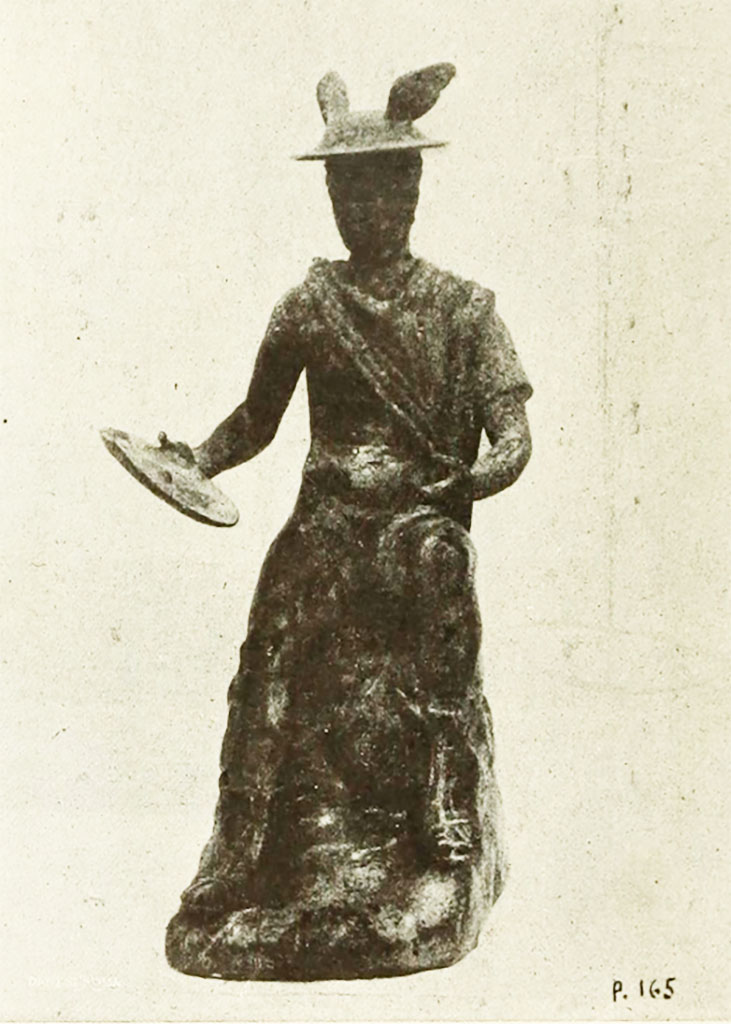 Bronze statuette of seated Mercury found in Lararium of VI.16.7. 
See Notizie degli Scavi di Antichità, 1907, p. 566, fig. 16.