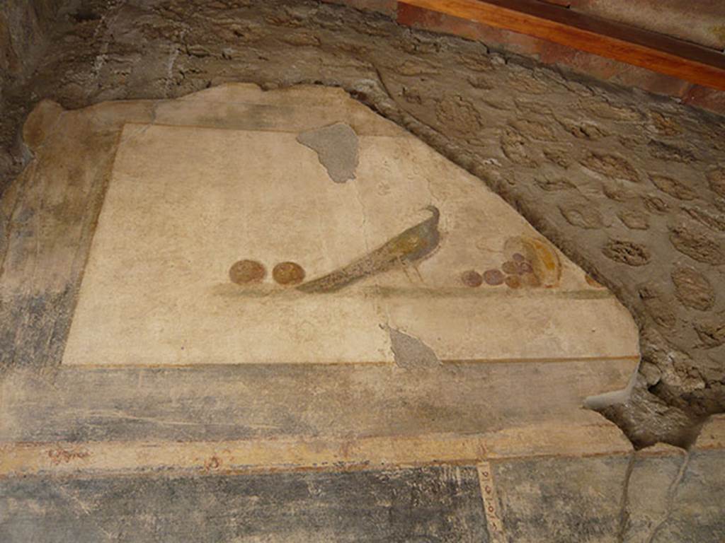 VI.16.7 Pompeii. June 2013. Entrance “A” upper north wall.
Painting of still life with peacock and fruit, after recent restoration. 
Photo courtesy of Buzz Ferebee.