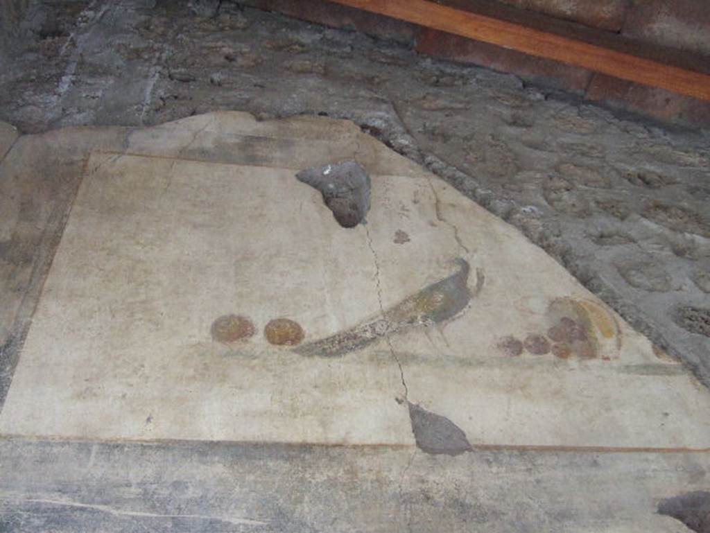 VI.16.7 Pompeii. May 2006. Entrance “A” upper north wall.
Painting of still life with peacock and fruit.