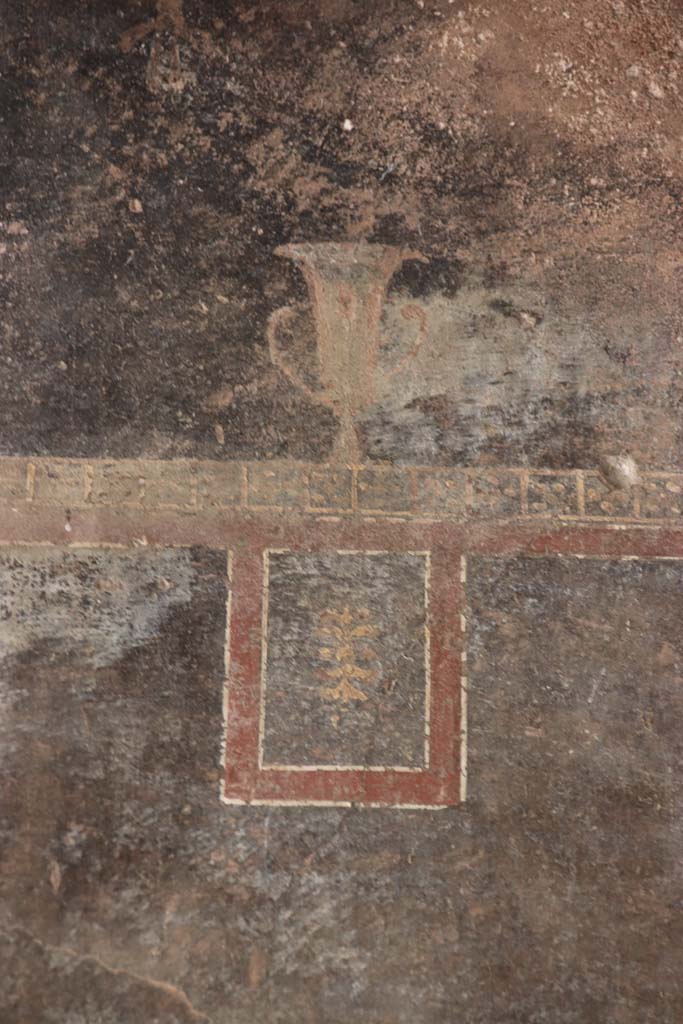 VI.16.7 Pompeii. September 2021. 
Peristyle F, detail from east wall of east portico at the southern end left of the lararium.
Photo courtesy of Klaus Heese.