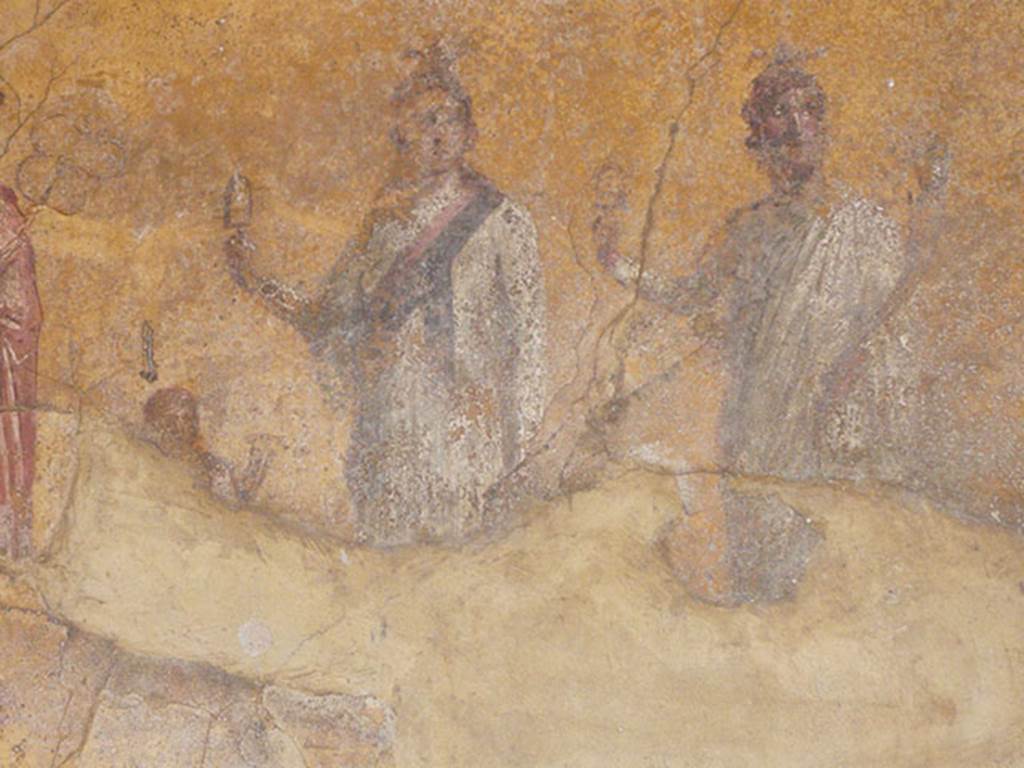 VI.16.7 Pompeii. June 2013. Room F, on the south wall of the peristyle. 
Painting of Isis and Osiris and the small figure possibly of Harpocrates, after recent restoration.  
Photo courtesy of Buzz Ferebee.