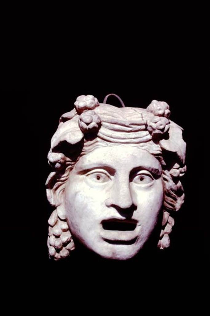 VI.16.7 Pompeii, 1978. Marble mask of a maenad. 
SAP inventory number 3014. Photo by Stanley A. Jashemski.   
Source: The Wilhelmina and Stanley A. Jashemski archive in the University of Maryland Library, Special Collections (See collection page) and made available under the Creative Commons Attribution-Non-Commercial License v.4. See Licence and use details.
J78f0584