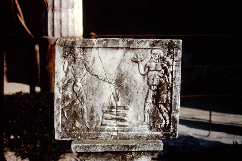 VI.16.7 Pompeii. 1966. Detail of rectangular relief showing a nude satyr and Silenus approaching a burning altar.  Photo by Stanley A. Jashemski.
Source: The Wilhelmina and Stanley A. Jashemski archive in the University of Maryland Library, Special Collections (See collection page) and made available under the Creative Commons Attribution-Non-Commercial License v.4. See Licence and use details.
J66f0255