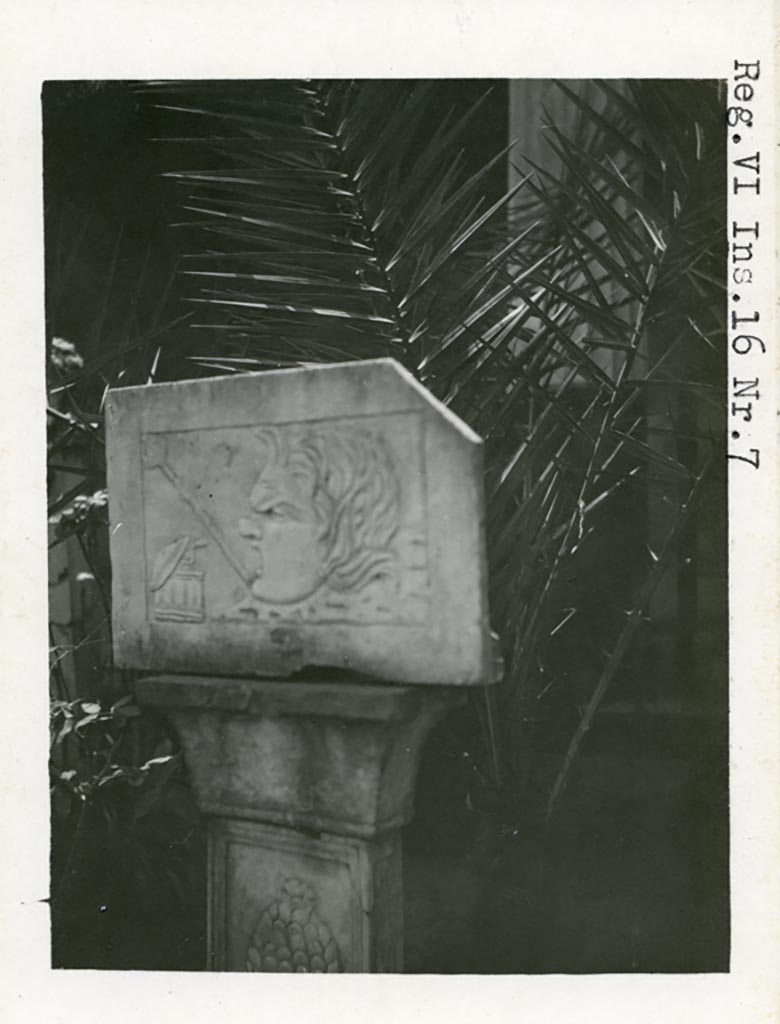 VI.16.7 Pompeii. Pre-1937-39. Marble relief on a pedestal.
Photo courtesy of American Academy in Rome, Photographic Archive. Warsher collection no. 495.
