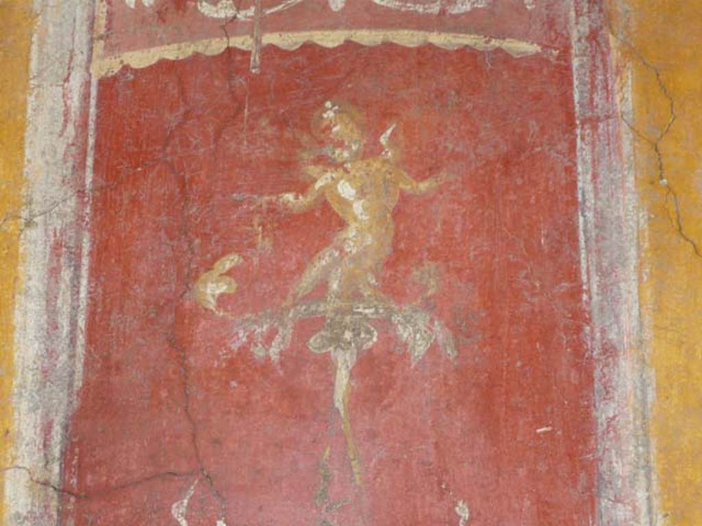 VI.16.7 Pompeii. June 2013.  Room N, detail of cupid on candelabra on east wall, after restoration.
Photo courtesy of Buzz Ferebee.