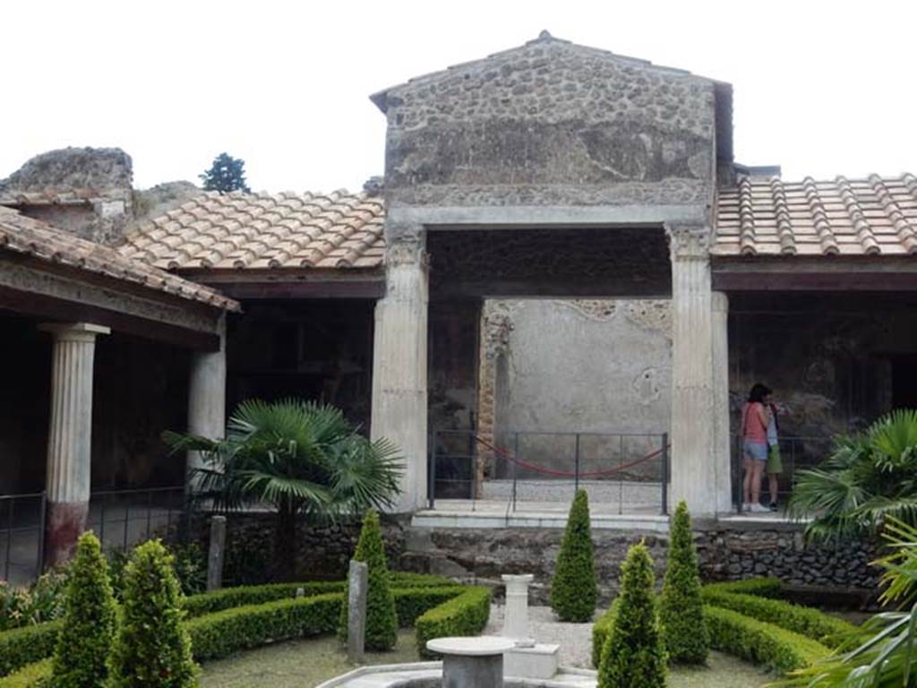 VI.16.7 Pompeii. May 2016. South-west corner of peristyle, on left, looking towards large triclinium, in the centre of the west side. Photo courtesy of Buzz Ferebee.