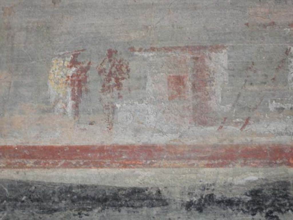 VI.16.7 Pompeii. May 2016. 
Room F, detail of lower part of painting on west wall above doorway to room R. Photo courtesy of Buzz Ferebee.
