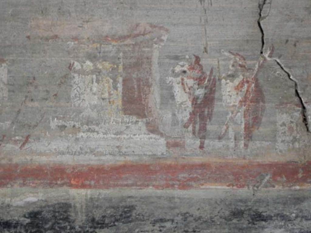 VI.16.7 Pompeii. May 2016. 
Room F, detail of lower part of painting on west wall above doorway to room R. Photo courtesy of Buzz Ferebee.