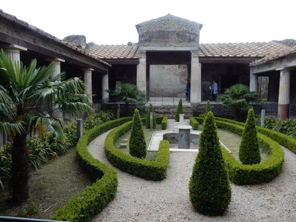VI.16.7 Pompeii. May 2016. Room F, looking west across peristyle garden from east portico. 
In the centre is a marble pool and around the garden were several statues. Photo courtesy of Buzz Ferebee.