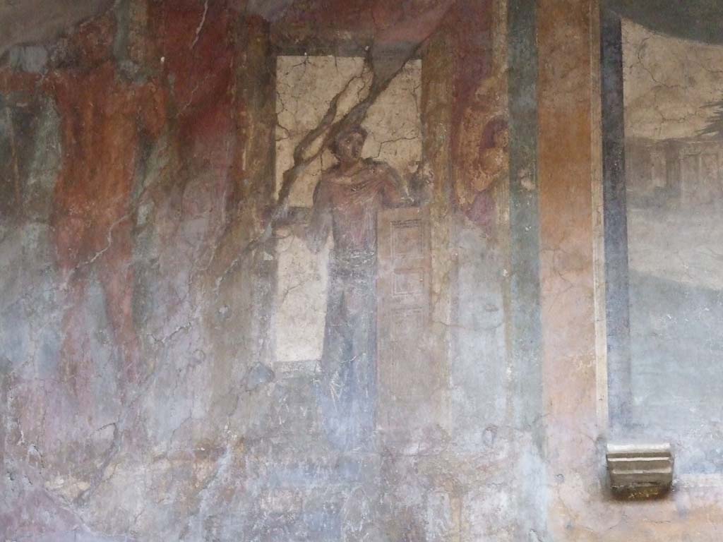 VI.16.15 Pompeii. December 2006. South end of upper west wall of atrium B above room D. 
Detail of wall painting of statue of Poseidon left and woman with patera, making an offering.