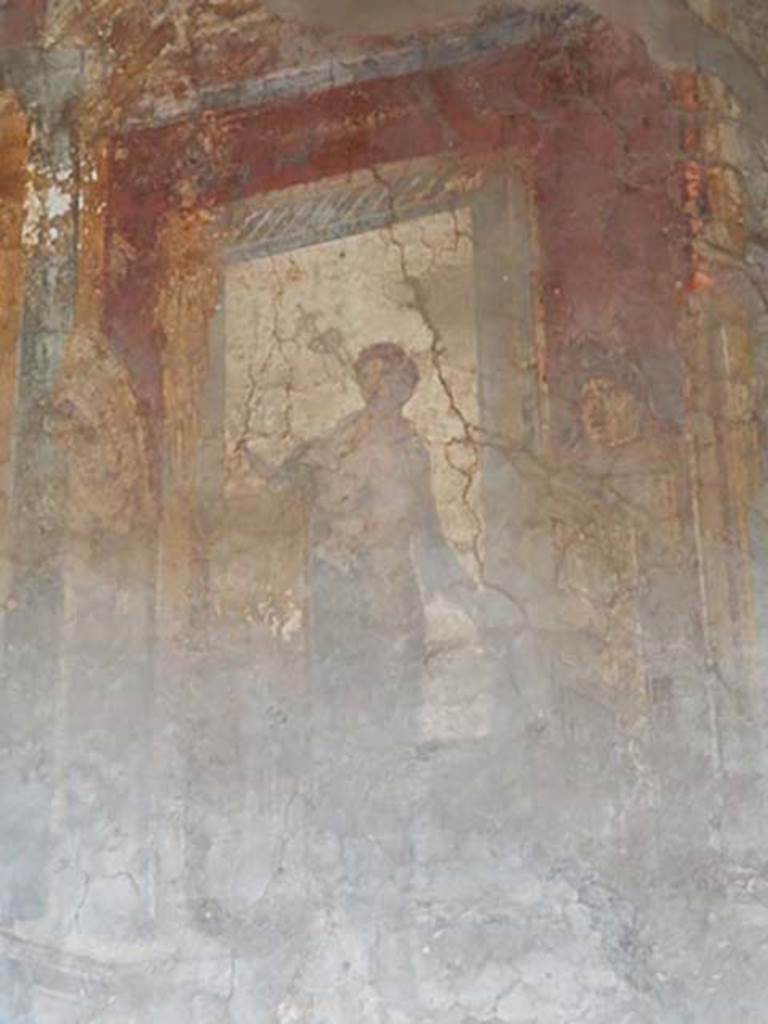 VI.16.15 Pompeii. May 2015. North end of upper west wall of atrium B above room E. 
Detail of wall painting of woman with patera, making an offering to the statue of Nike. Photo courtesy of Buzz Ferebee.